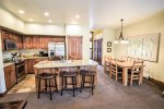 Open floor plan with fully equipped kitchen